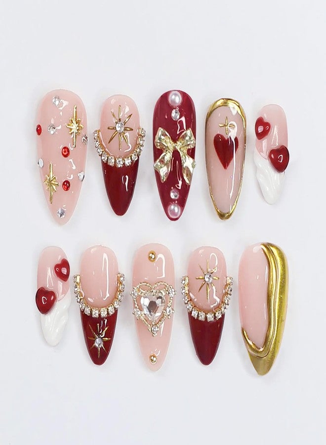 KRTBKR 24Pcs Valentines Day Press on Nails Medium Almond Red French Tip Fake Nails Gold Bow Star with Rhinestones Bling Full Cover Glue on Nails 3D Heart False Nails Valentines Stick on Nail for Women - Image 1